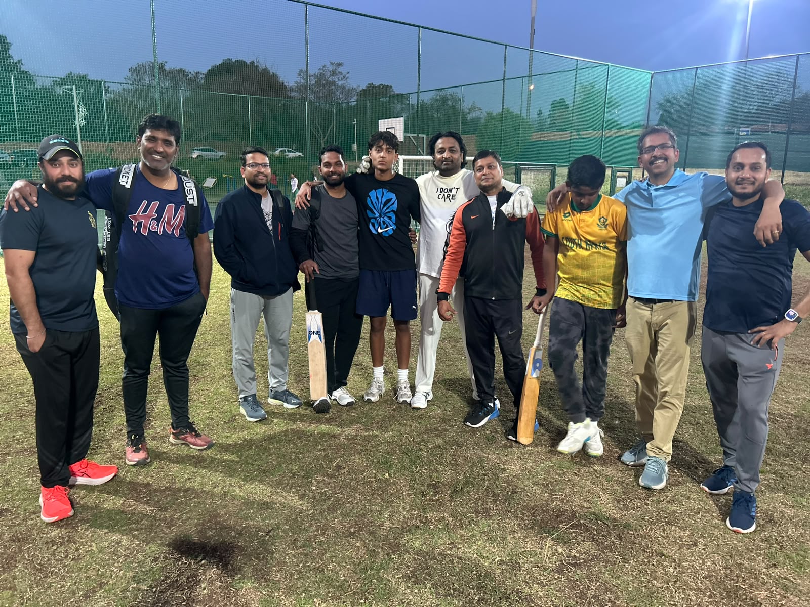 TEN12 practice squad under floodlights